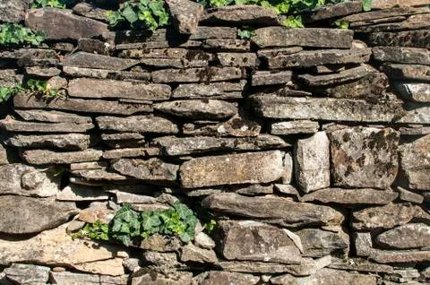 Stone wall closeup Stock Photos