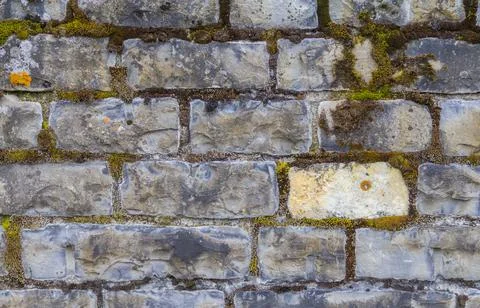 Stone wall closeup Stock Photos