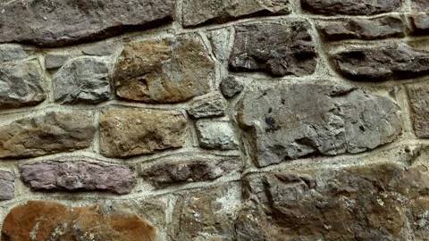 Stone wall closeup tilt upwards Stock Footage 273964063