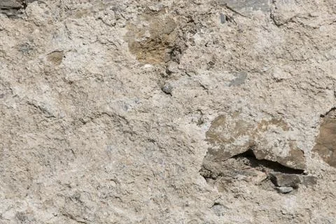Stone wall, covered with cement Stock Photos