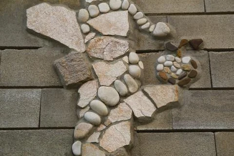 Stone wall with decoration Stock Photos