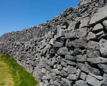 Stone wall at dun aonghasa aran islands Stock Photos