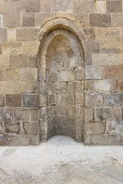 Stone wall with embedded niche Foto stock