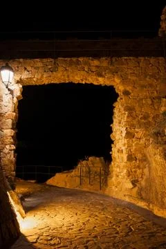 Stone Wall Gate in Tossa at Night Fotos de archivo