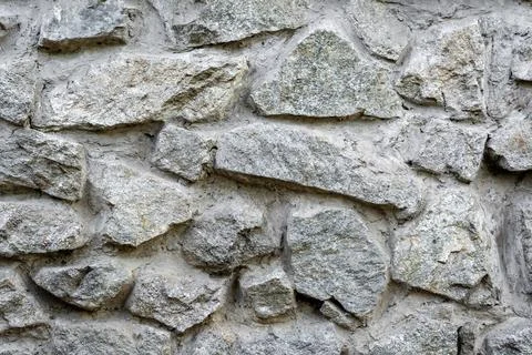 Stone wall grey material texture wall Stock Photos