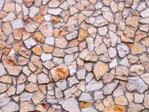 The stone wall of the house. Texture, background. Foto stock
