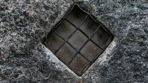 Stone wall iron grid texture 1 By Linus Stock Photos