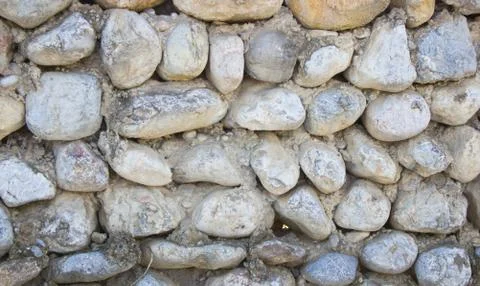 Stone wall lined with stone Foto stock