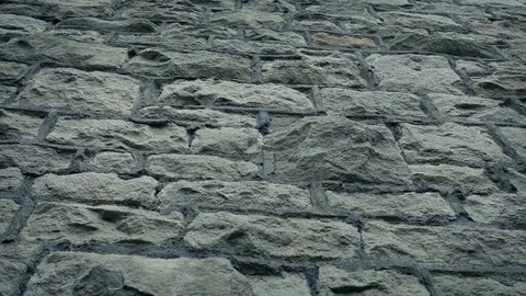 Stone Wall Low Angle Moving Shot Stockbeeldmateriaal 114462102