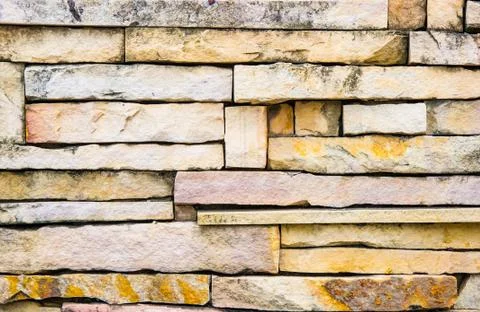 Stone wall made with blocks Stock Photos