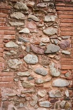 Stone wall made of erratics and bricks Stock-Fotos