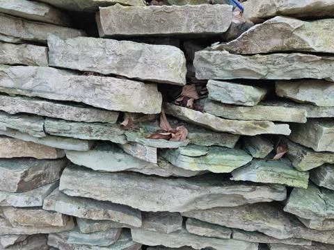 Stone Wall Made of Flat Slabs Stock Photos