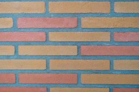 Stone wall made of rectangular bricks closeup 스톡 사진