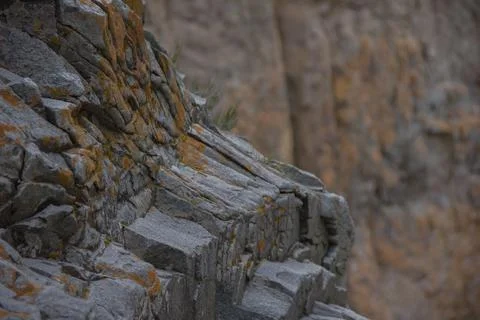 Stone wall Mountain rough rock texture Stock Photos