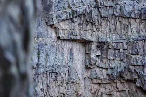 Stone wall Mountain rough rock texture Stock Photos