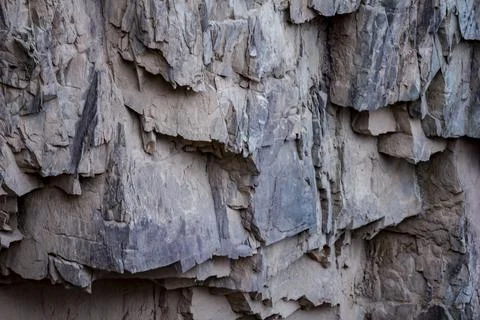 Stone wall Mountain rough rock texture Stock Photos