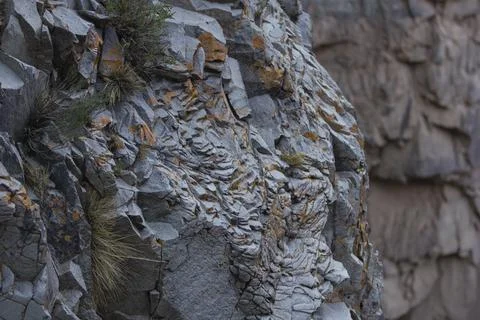 Stone wall Mountain rough rock texture Stock Photos