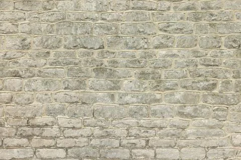Stone wall of an old house. Full frame pattern or texture, UK Fotos de archivo