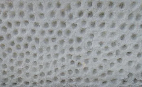 A stone wall panel with a deep pattern suitable for a background or texture Stock Photos