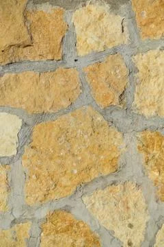 Stone wall pattern. Big concrete bricks outside. Stock Photos