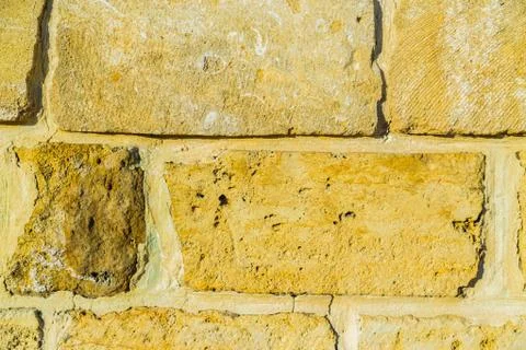 Stone wall pattern. Big concrete bricks outside. Stock Photos