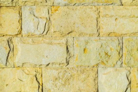 Stone wall pattern. Big concrete bricks outside. Stock Photos