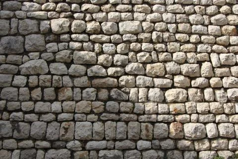 Stone Wall Pattern with diagonal Shadow across it Stock Photos
