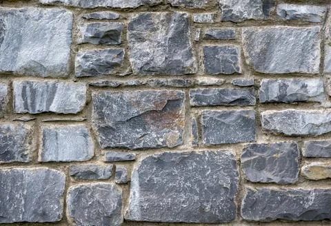 Stone wall pattern, natural stone texture, ground pavement background Stock Photos