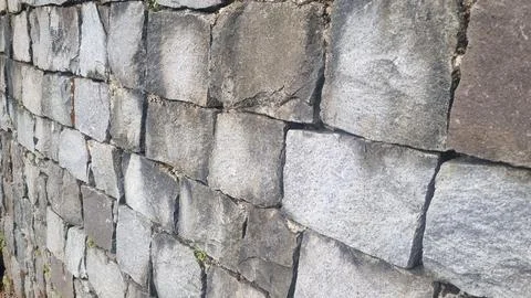 Stone wall pattern. Old castle stone wall background. Stock Photos