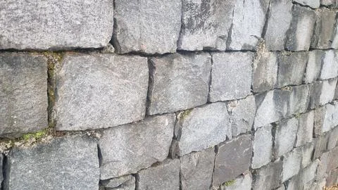 Stone wall pattern. Old castle stone wall background. Stock Photos