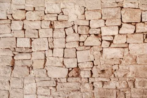 Stone wall pattern old light brown Stock Photos