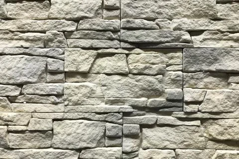 Stone wall with rectangle stones interior craft design Stock Photos