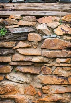 Stone wall from rough stone Stock Photos