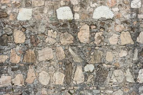 Stone wall rustic texture big seamless background Fotos de archivo