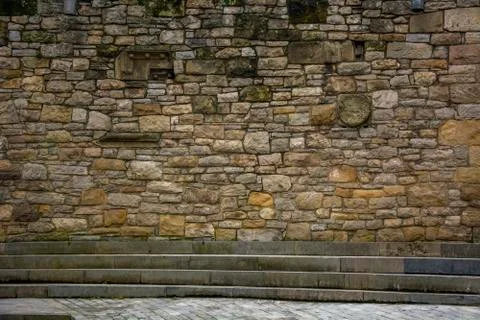 Stone wall with several steps Stock Photos