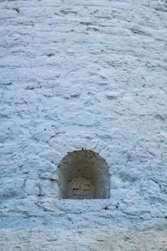Stone wall with a small window. Kazan Kremlin 写真素材
