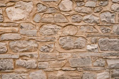 Stone wall structure of an old house Stock Photos