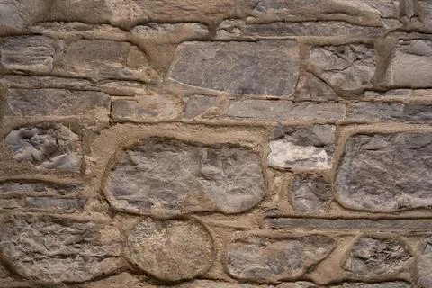 Stone wall structure of an old house Stock Photos