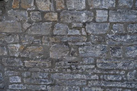 Stone wall structure of an old house Stock Photos