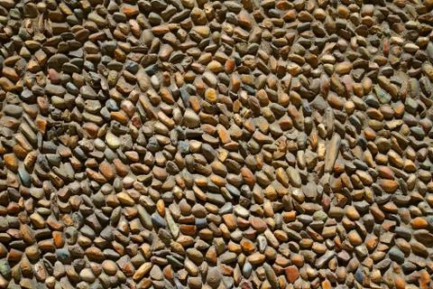 Stone wall in the sun Stock Photos