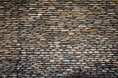 Stone wall surface with cement Stock Photos