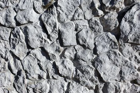 Stone wall texture abstract background. Grey Brickwork, stonework wall Stock Photos