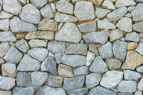 Stone wall texture and background. Stock Photos