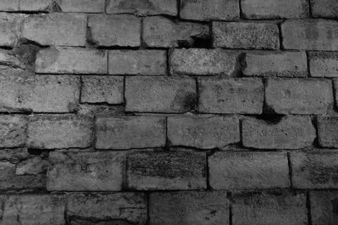 Stone wall texture antique ancient history black and white Foto stock