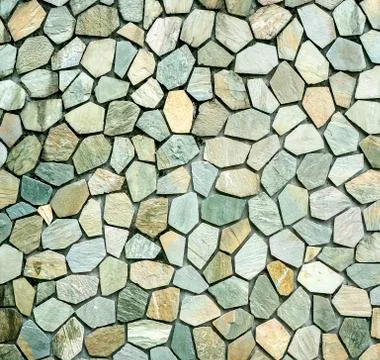 Stone wall texture background of grey brick stones Stock Photos