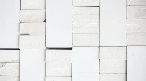 Stone wall texture background - grey stone siding with different sized stones Stock Photos