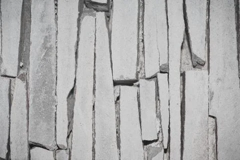 Stone wall texture background - grey stone siding with different sized stones Stock Photos