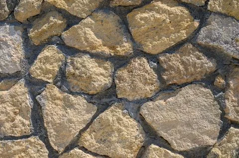 Stone wall texture background - grey stone Stock Photos