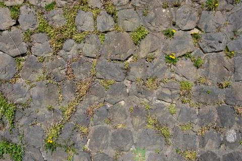 Stone wall texture background natural color Stock Photos