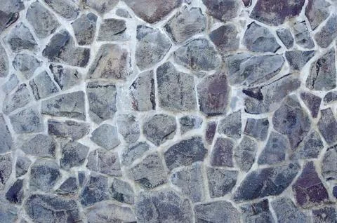 Stone wall texture background natural color Stock Photos